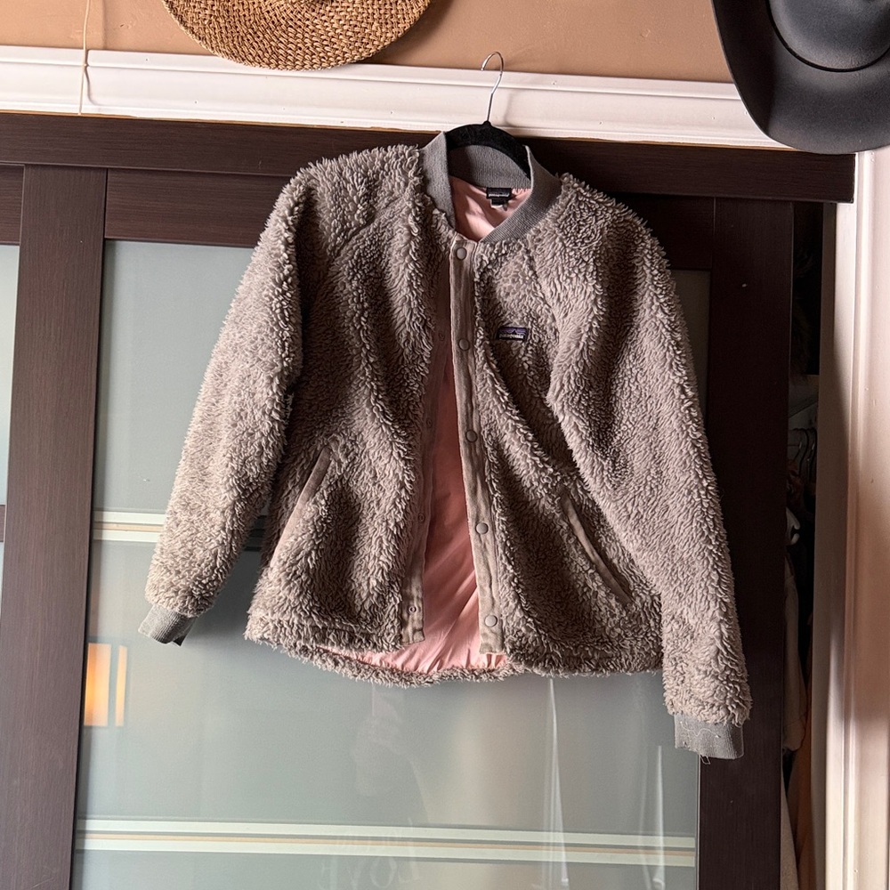Patagonia Kids Fuzzy Puffer Jacket in Taupe with Pink Lining